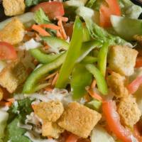 House Salad · Fresh spring mix, green peppers, carrots, croutons, cucumbers, mozzarella and tomatoes. Made...