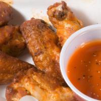 Wings · High-quality crispy wings that come with your choice of four delicious flavors. Served with ...