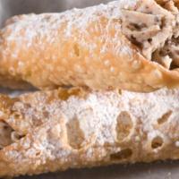 2 Cannoli · Two delectable Sicilian style pastry desserts.