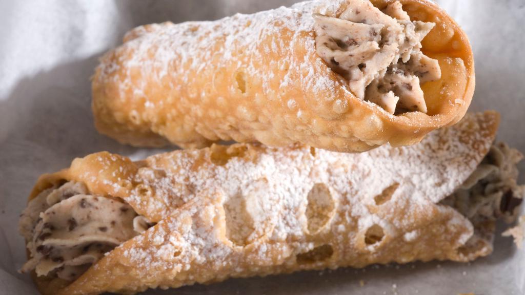 2 Cannoli · Two delectable Sicilian style pastry desserts.