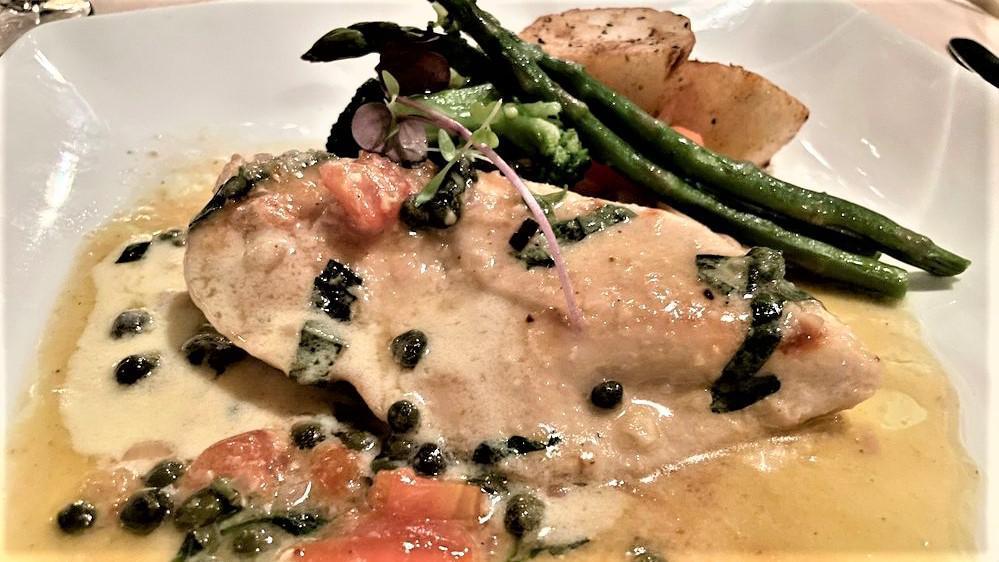 Chicken Piccata Torino · Chicken breast, salted butter, dry white wine, lemon juice, Italian capers, diced tomatoes and chopped parsley, minced garlic.