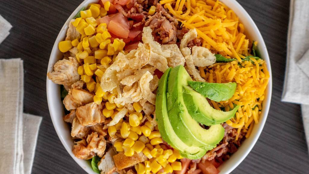 Bbq Chicken Salad · Romaine, BBQ chicken, bacon, tomatoes, avocado, corn, cheddar cheese and crispy onions. Ranch dressing