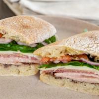 Italian Sandwich · City ham, cotto salami, prosciutto, house-made olive tapenade, provolone cheese, lettuce, to...