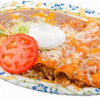 Enchilada Plate · 3 corn tortillas filled with choice of meat and topped with red enchilada sauce, cheese, and...