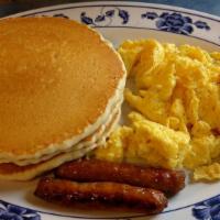 Pancake Combo · Three pancakes served with three eggs any style, two slices bacon or two sausage links or ham.