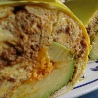 Breakfast Burrito Breakfast · Warm flour tortilla filled with scrambled eggs, mixed with Cheddar cheese, avocado and choic...