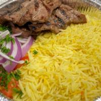 Beef Kabob Rice Bowl · Seasoned pieces of Beef Tri-Tip flame broiled to perfection. Topped with Tomatoes, Onions, a...