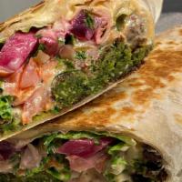 Falafel Wrap · Deep fried patties of ground Garbanzo Beans mixed with herbs, and spices. Topped with Lettuc...