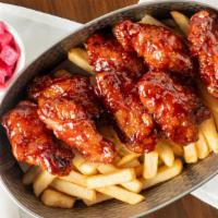 Sauced Chicken Wing Combo · Sauced Chicken Wing comes with fries, one side dish and our homemade sauces.