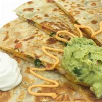 Quesadilla · Choice of protein with side of guacamole and sour cream.