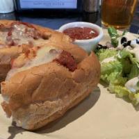 Meatball Sub · Baked meatball, green peppers, red onions, house marinara, provolone