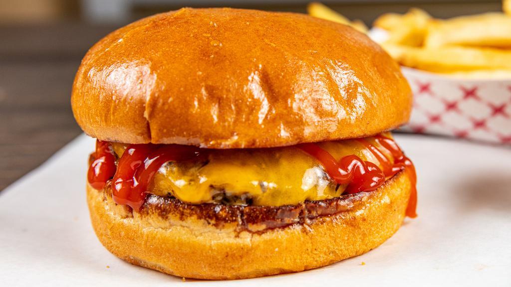 Kids Burger W/Fries · fresh angus beef patty | cheddar | ketchup | brioche
