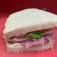 Quarantine Dream Daily Special · Classic Ham and Swiss on white bread with a touch of mayo and yellow mustard served with fre...