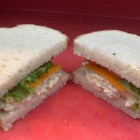 Classic Egg Salad · daily fresh made egg salad with cheddar cheese, lettuce and tomato served on fresh baked whi...