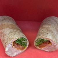 Turkey Bacon Wrap · Turkey and Bacon on a large tortilla with ranch dressing, cheddar cheese, lettuce, and tomato