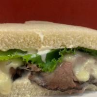 Hot Roast Beef · Succulent Roast Beef with melted provolone cheese, mayo, lettuce, tomato and ranch dressing ...