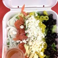 Greek Salad · Organic Green Leaf Lettuce, Cucumber, Tomato, Olive, Onion and Feta Cheese crumbles served w...