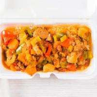 Jambalaya · Spicy cajun stew with andouille sausage served over steamed rice