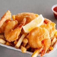 Prawns And Fries · Five Jumbo Size Prawns Deep Fried served with hand cut fresh French fries, served with One T...