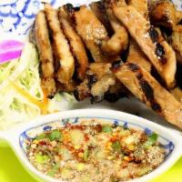 Moo Yang (Northeastern Thai Style) · Grilled marinated pork served with spicy chilli sauce.