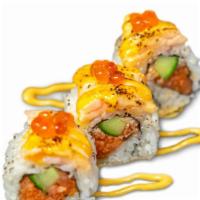 Beast Roll · Spicy tuna, cucumber topped with spicy seared salmon and ikura.
