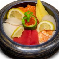 Chirashi Bowl · Rice topped with 2 pcs king salmon, 2 pcs fresh bluefin tuna, 2 pcs white tuna, 2 pcs shrimp...