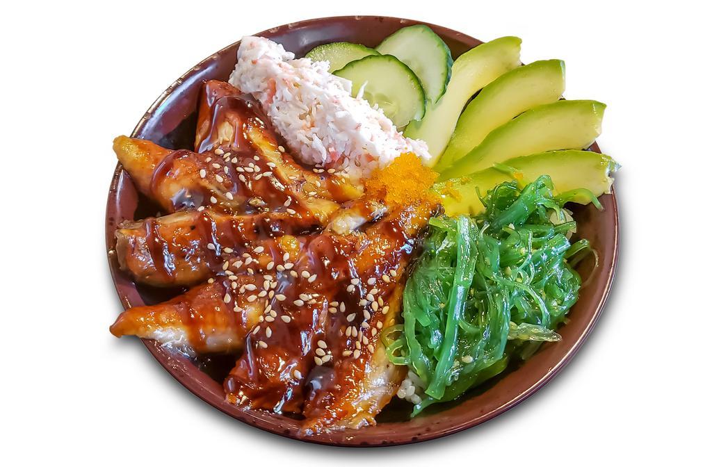Unagi Don · Rice topped with 6 pieces unagi, crab salad, seaweed salad, cucumber, avocado, and masago.