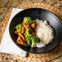 Chicken With Broccoli · Stir-fried teriyaki chicken and broccoli with special house made sauce on top of white rice