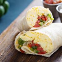 The Breakfast Burrito · Fresh eggs, ham, creamy cheese, and pico de gallo wrapped in a fresh made tortilla.