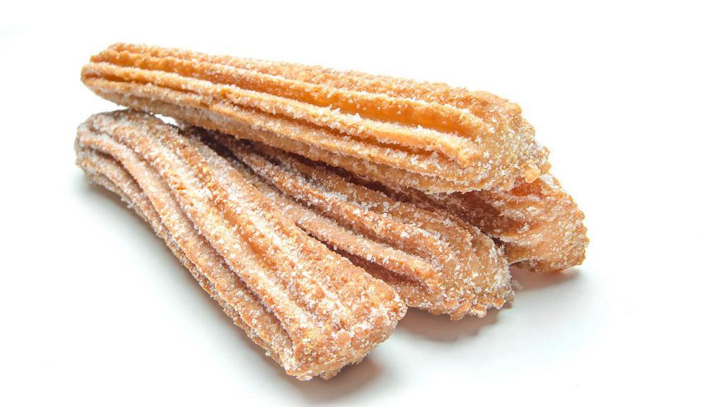 The Churros · Homemade Mexican style fried pastry dough covered with sugar.