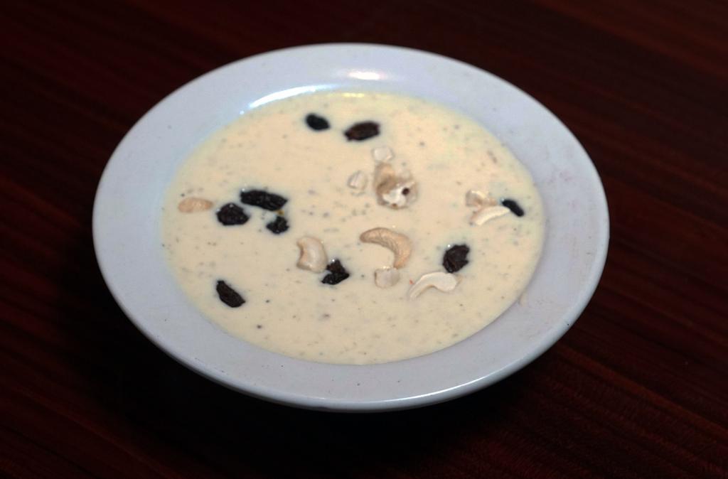 Badam Kheer · Thick creamy dessert with a rich almond base.