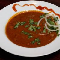Rogan Josh · A specialty of kashmir, lean lamb pieces cooked in yogurt & a blend of fragrant spices.