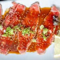 Beef Carpaccio · Hot. Thinly sliced new York strip and served with a spicy wasabi citrus sauce.