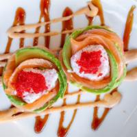 Cherry Blossom · Hot. 2pcs crab, avocado and tobiko wrapped in fresh salmon and a tangy, spicy sauce.
