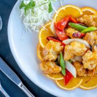 Orange Chicken · Hot. fried golden brown and tossed with citrus orange peels in sweet and spicy sauce.