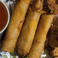 Djan'S Platter · Assortment of 4 appetizers including fried veggie roll, crab rangoon, fried tofu and Japanes...