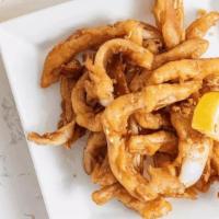 Fried Fiery Calamari · Fried calamari in garlic and chilli served with sweet & sour sauce.