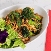 Pad See Eiw · Stir-fried flat noodles with egg and broccoli in sweet soy sauce.