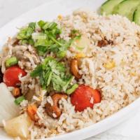 Pineapple Fried Rice · Stir fried rice with chicken, egg, onions, pineapple, cashew nut, green onions, carrots and ...