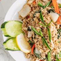 Basil Fried Rice · Stir-fried rice with choice of chicken, beef, or tofu cooked with basil, green bean, jalapen...