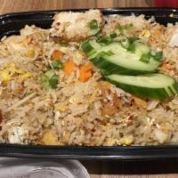 Djan'S Fried Rice · Grilled marinated chicken over Fried Rice with egg, onions, carrots,. green onions and tomat...