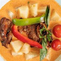 Joy Duck Club · Roasted duck in red curry, pineapple, bamboo shoots, tomatoes, bell peppers, zucchini and ba...