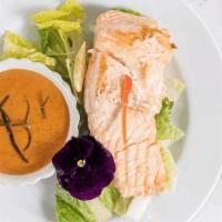 Salmon In Heat · Grilled salmon and topped with Thai curry sauce.