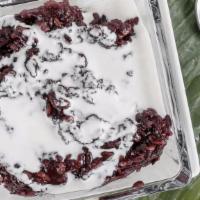 Black Sticky Rice · Sweet rice pudding topped with coconut milk.