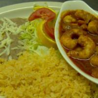 Camarones Endiablados · Large shrimp, smothered in extra hot (picoso) sauce, rice, beans, salad.