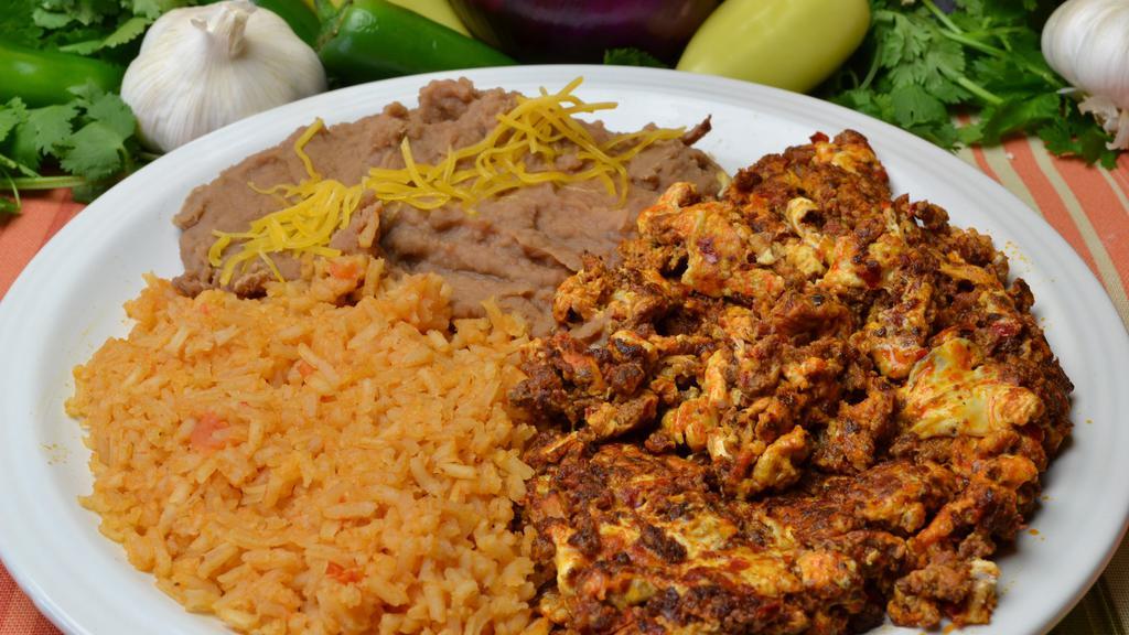 Chorizo Plate · Chorizo scrambled with eggs, with flour tortilla, rice and beans on the side.