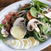 Spinach Salad · Spinach, mushrooms, onions, real bacon, hardboiled egg, tomatoes, Feta cheese. Honey mustard...