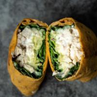 Watch Your Waist Wrap · Chicken, spinach, mozzarella, red onion, guacamole and Tzatziki sauce in a tomato basil wrap