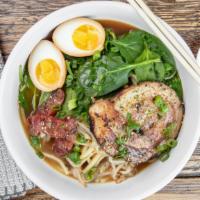 Tonkotsu Ramen · 24-Hour simmered pork and chicken broth and tare with noodles topped with chashu (marinated ...