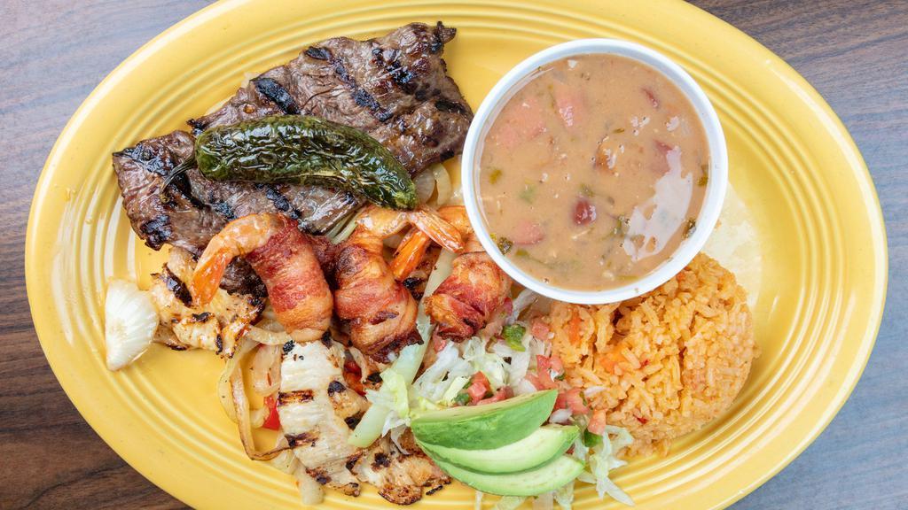 Tres Amigos · Carne asada, grilled chicken and bacon wrapped shrimp served with frijoles a la charra, rice, avocado slices and warn tortillas.